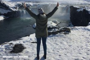 Woman with outstretched arms - Insight Vacations