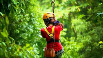 Woman ziplining - Costa Rica adventure tour for Women over 50