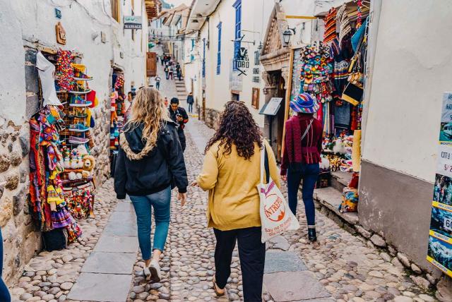 Women walking down an alley - Interpid - Women over 50 Peru