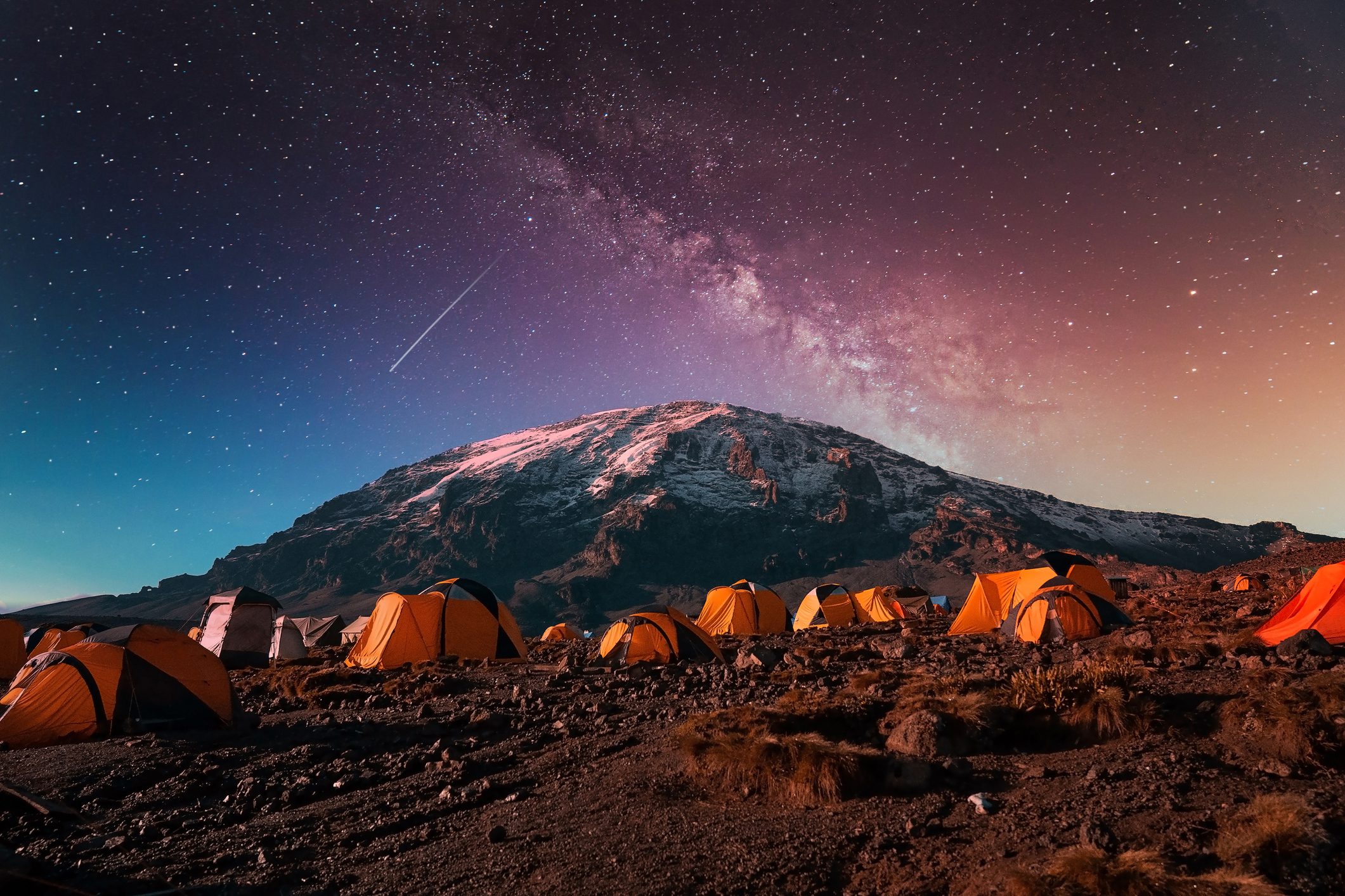 Campsite on Kilimanjaro mountain background under the Milky Way