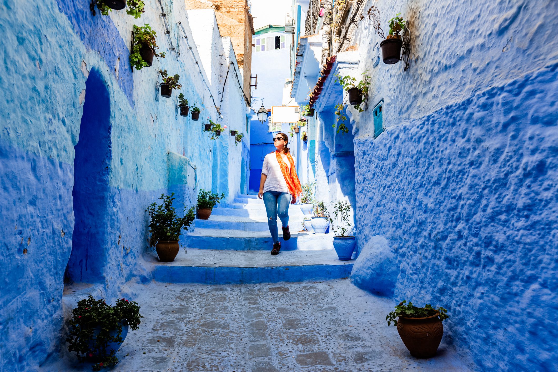 Narrow streets and blue painted houses of Chefchaouen city, Morocco.