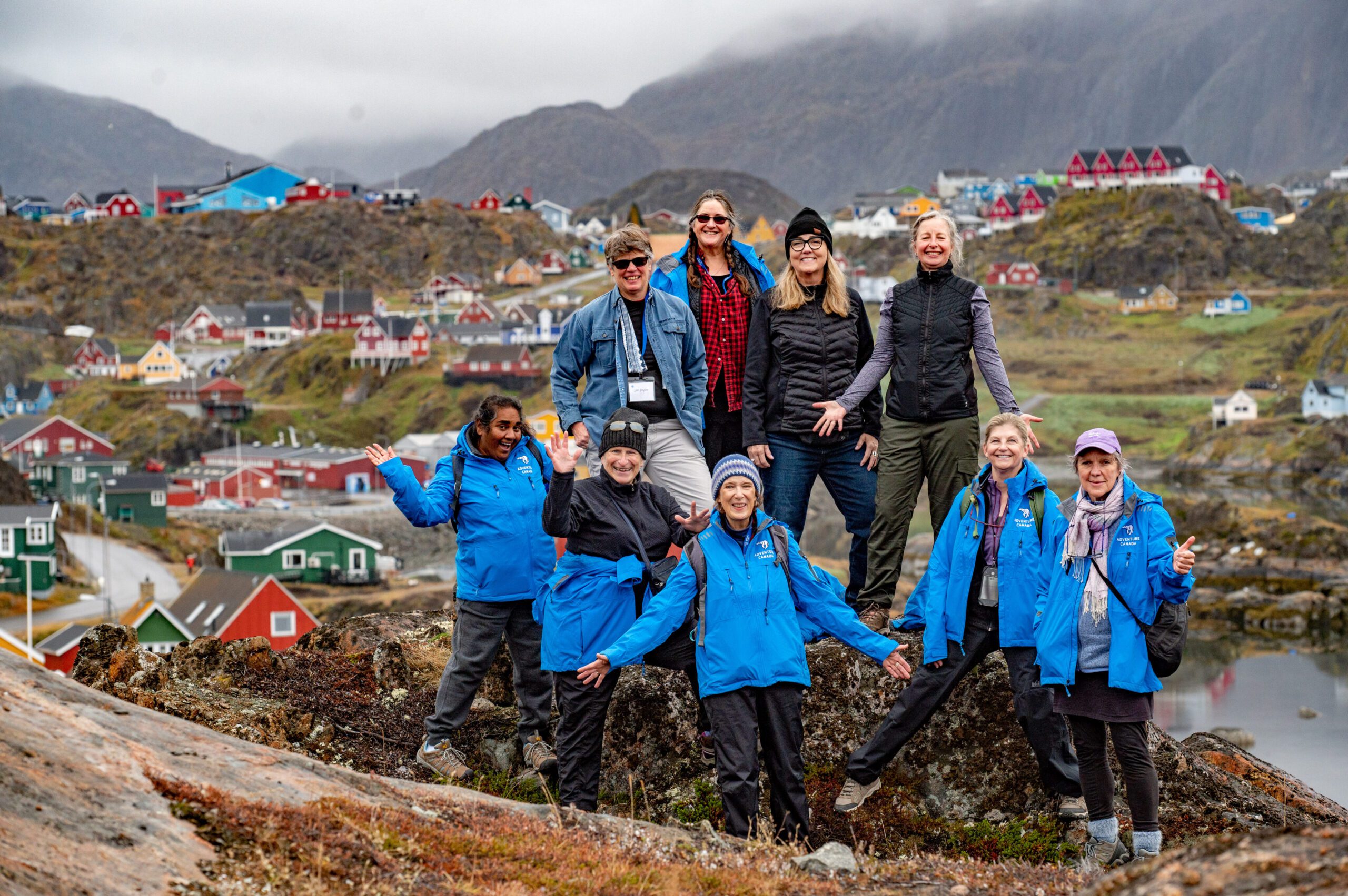 A group of tour participants exploring the breathtaking landscapes of Baffin Island and Greenland