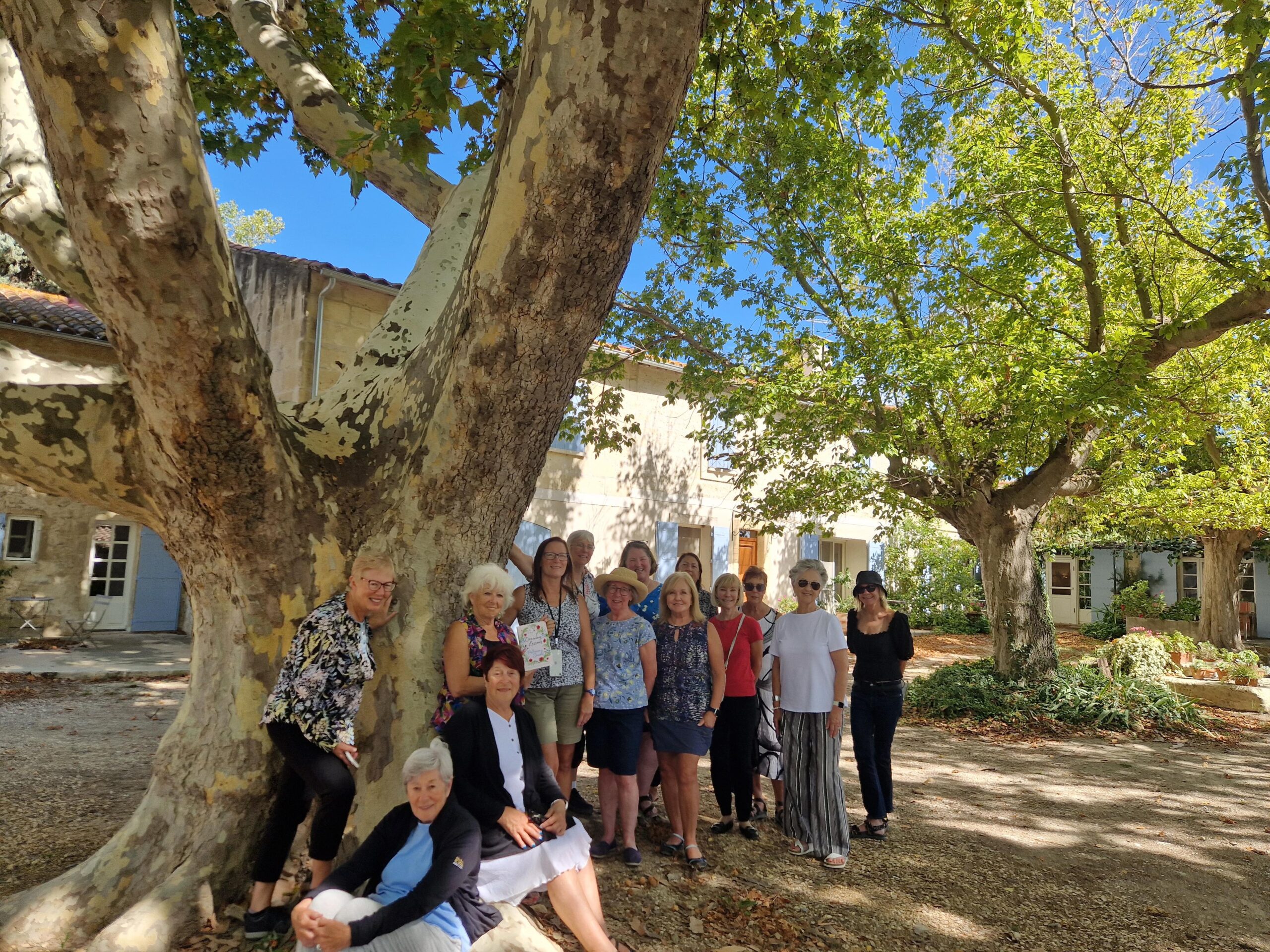 An Absolutely Southern France tour group poses for a picture on their South of France womens tour.
