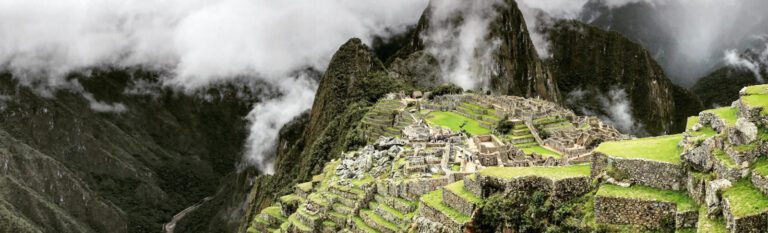 Marvelling at the view of Machu Picchu on a cloudy day - Machu Picchu Volunteer Trip - Conservation VIP