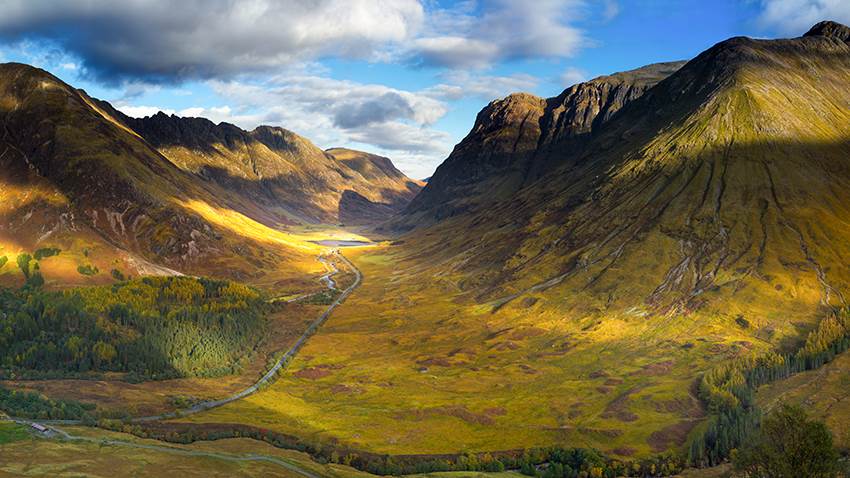 Panoramic view of the rugged Glencoe Mountains on the way to admire The 'Glen of Weeping' - Highland Trail inspired by Outlander - Brendan Vacations