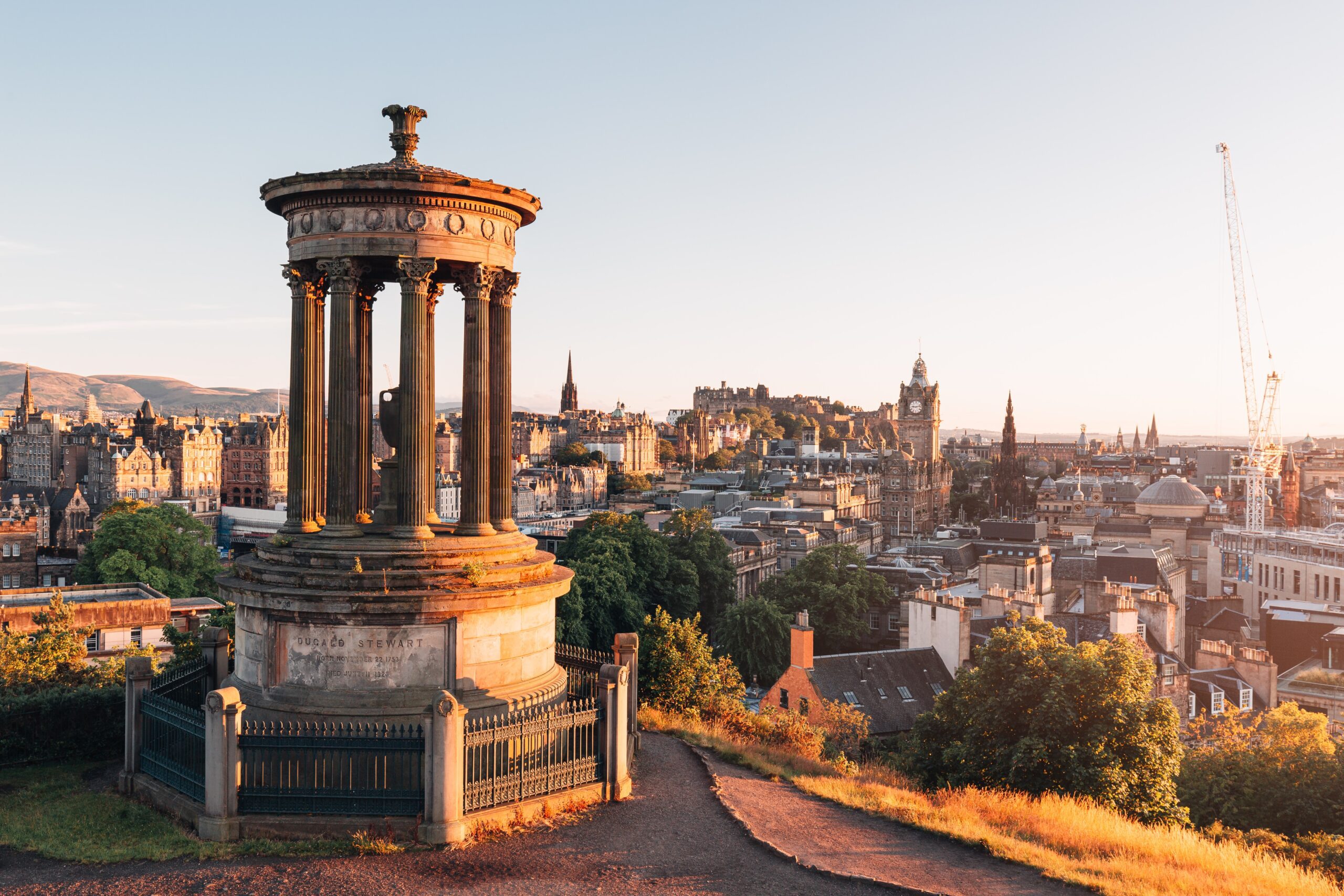 Edinburgh, Scotland glows gold in the light of the setting sun. Scotland, a Culinary Journey through Edinburgh & the Highlands - Global Palate Adventures