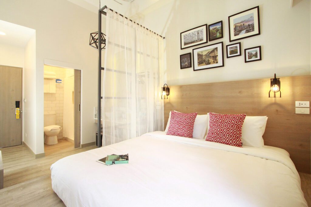 A simply decorated private room with a queen sized bed at the Lub D hostel in Phuket. HostelWorld