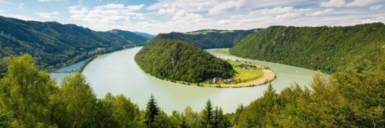 Stunning panoramic view of the majestic Danube River winding through picturesque landscapes - ACTIVE & DISCOVERY ON THE DANUBE (WESTBOUND) - Avalon Waterways