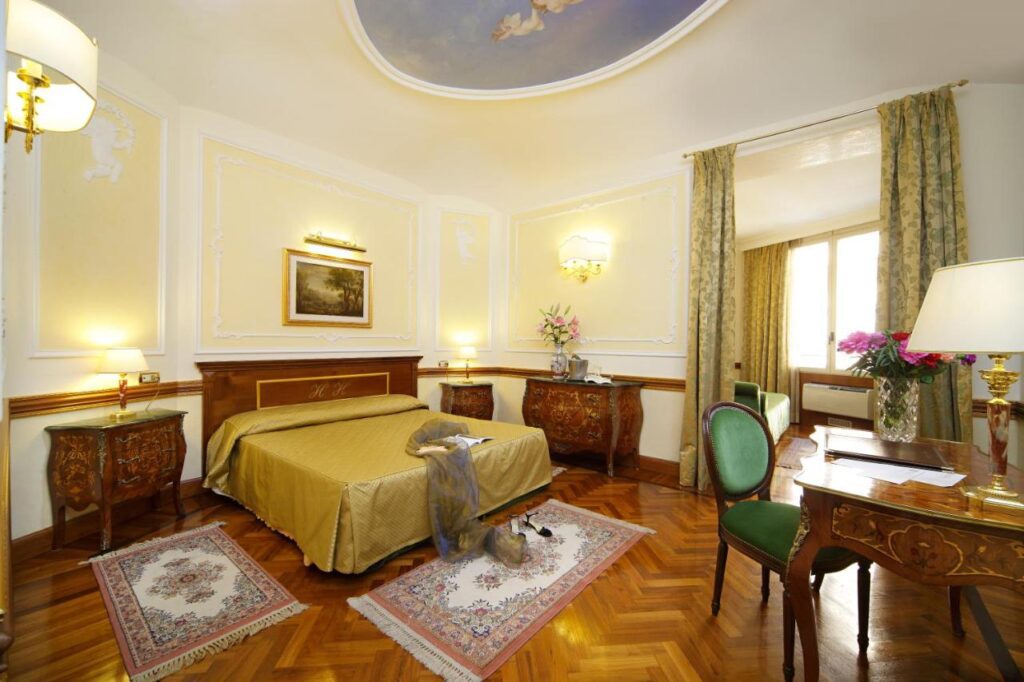 A large queen room at the Hotel Hiberia in Rome, Italy - recommended by JourneyWoman readers as a safe place for women to stay.