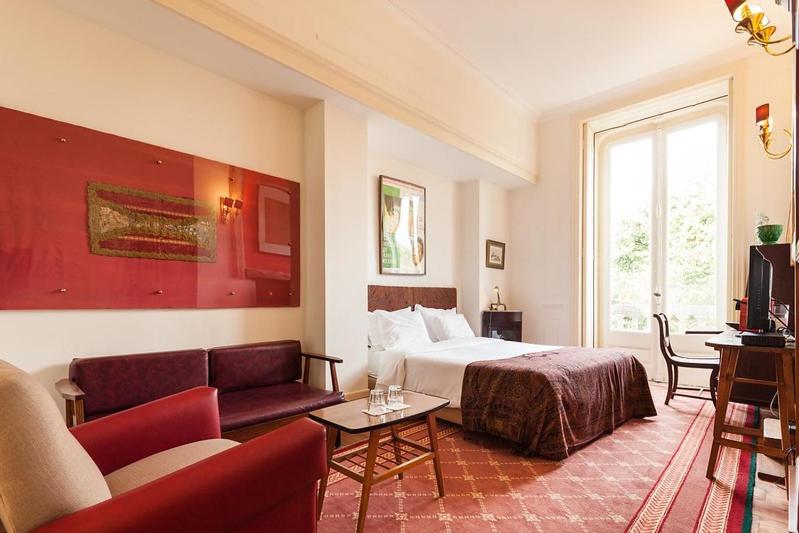 A single room with double bed at the Independente Príncipe Real boutique hotel in Lisbon, Portugal, recommended as a safe place for women to stay.