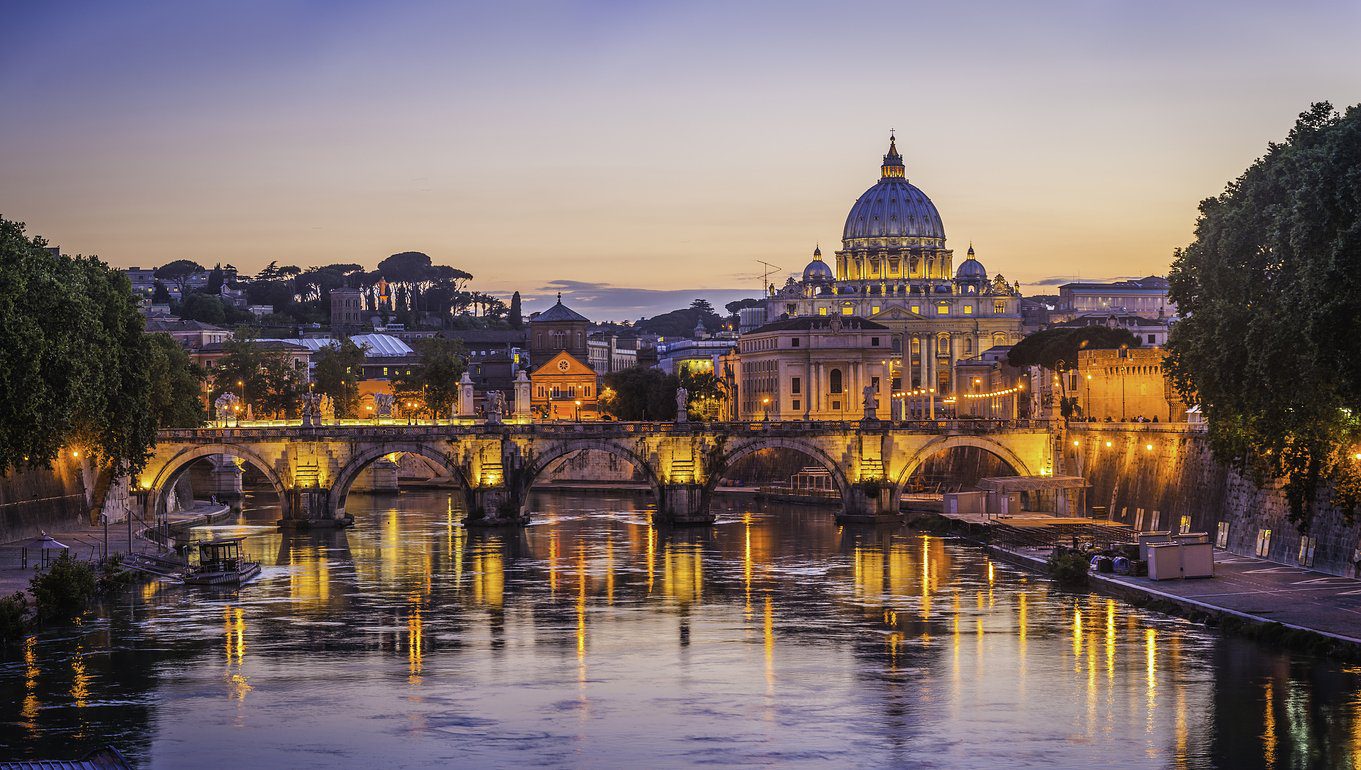 Admiring the St. Angelo Bridget at dusk - Fall in Love with Rome