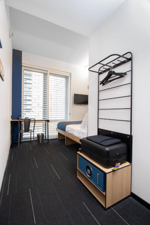 A simple room at the POD Times Square in New York, New York, recommended as a safe place for women to stay.