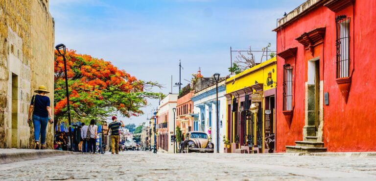 Vibrant, colorful streets of Oaxaca lined with historic architecture and lively culture - Vibrant Oaxaca