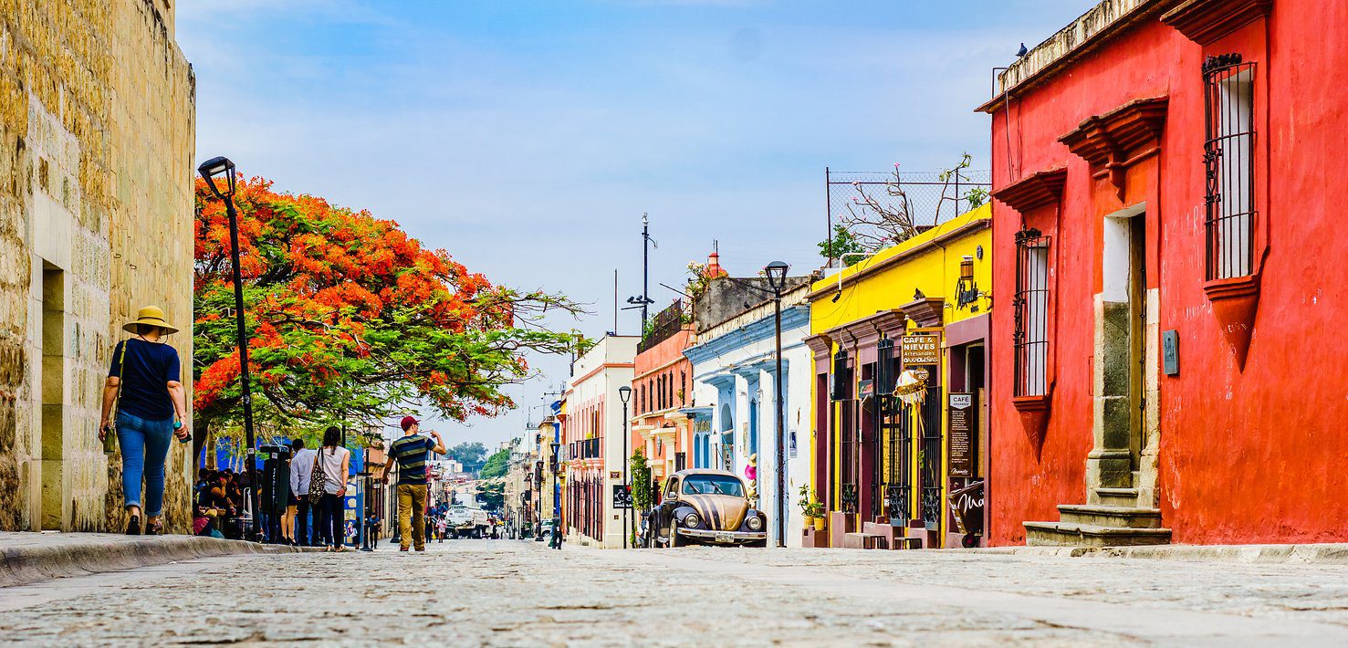 Vibrant, colorful streets of Oaxaca lined with historic architecture and lively culture - Vibrant Oaxaca