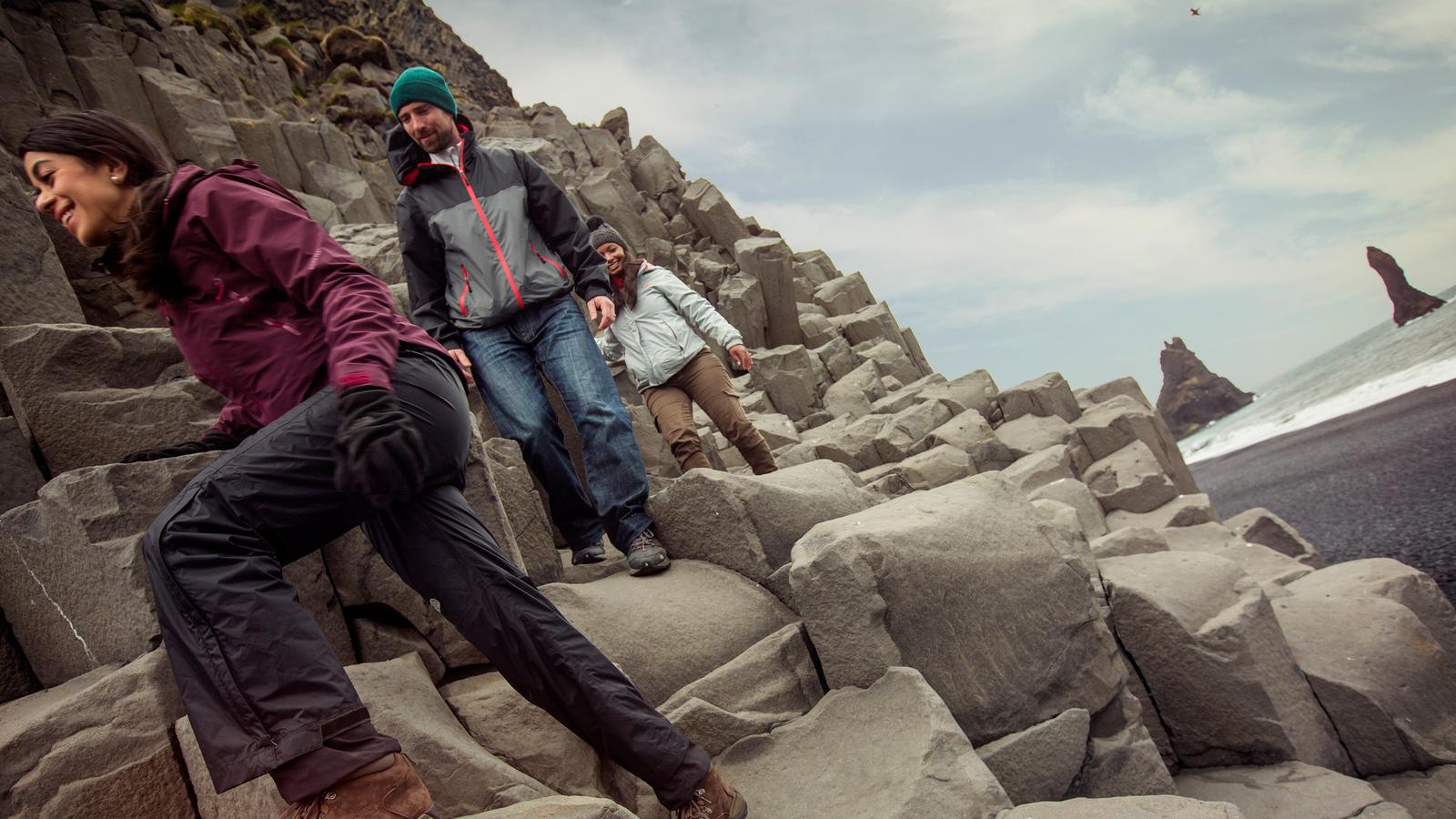 A group of travelers by the Reynisfjara beach