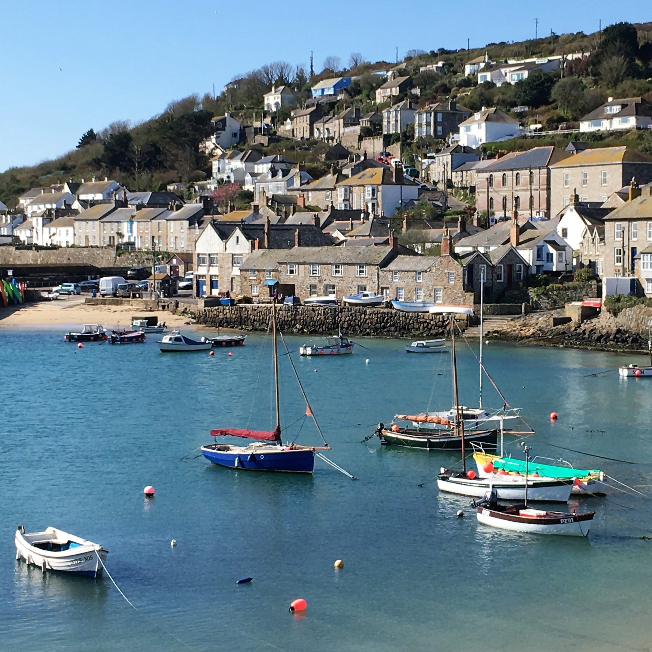 Mousehole Square with boats to illustrate the Cornwall Experience women only trip with European Experiences.