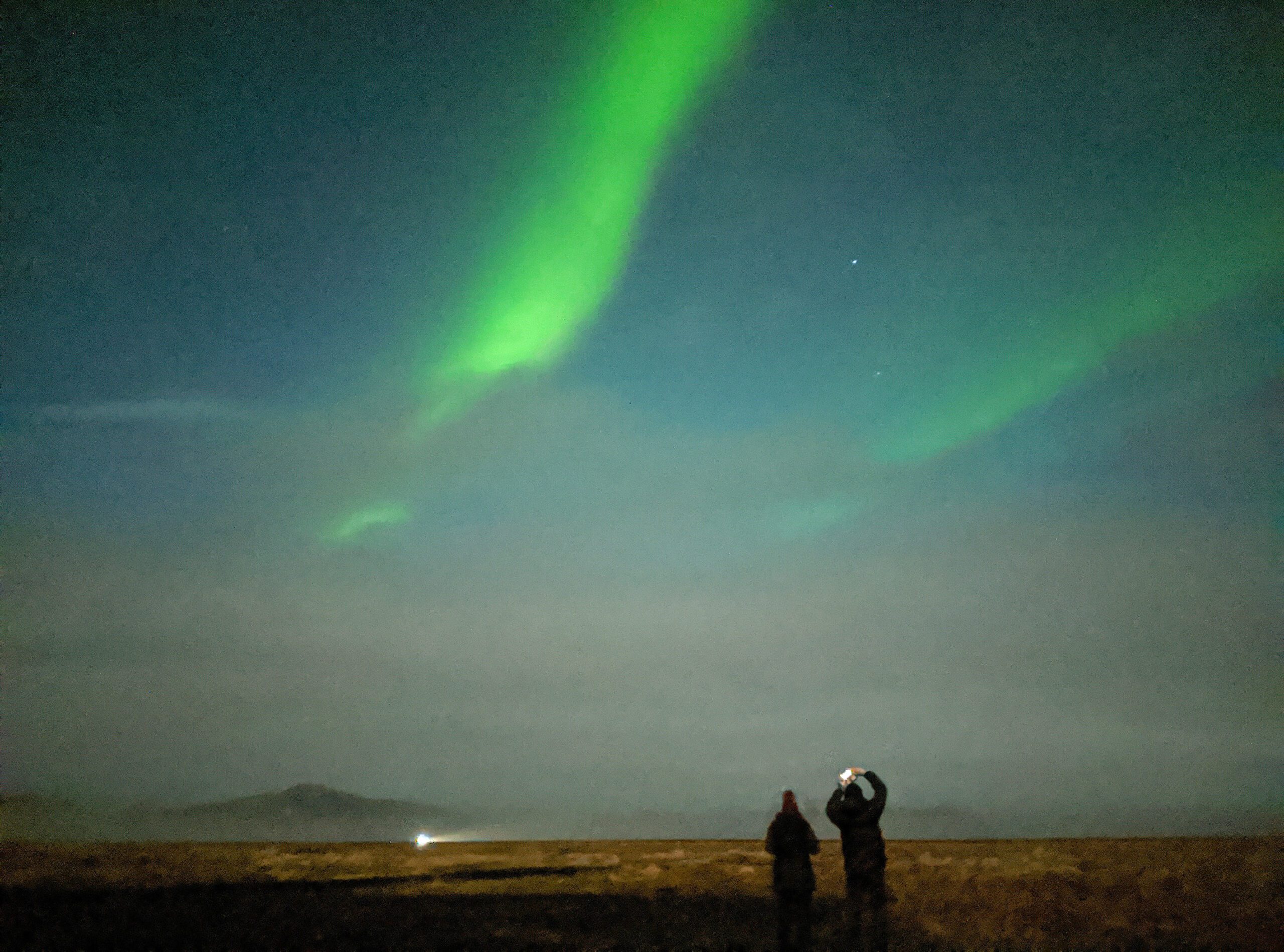 Witnessing the mesmerizing Northern Lights in Myrdalshreppur, a breathtaking experience on the Iceland's Magical Northern Lights tour.