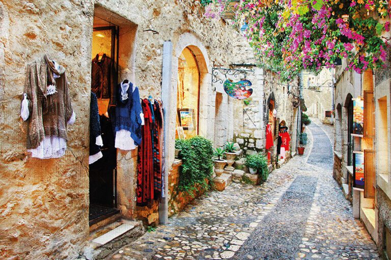 A cobble-stoned street of Alassio, where you will stroll as part of the French & Italian Riviera Splendor tour by Just You.