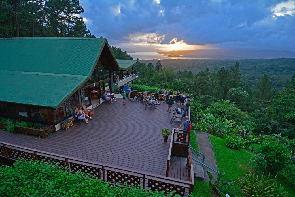 The Arenal Observatory Lodge in La Fortuna, Costa Rica, blends into the mountainside offering unmatched views of the rainforest canopy. It is recommended by JourneyWoman readers as a safe place for women to stay.