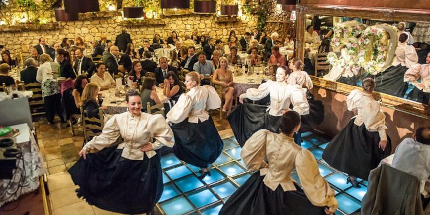 Dancers in traditional costume tell folklore trough their dance, an experience that's part of the Valletta and Hidden Gems of Malta tour with Just You.