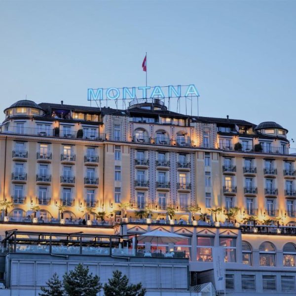 The Art Deco Hotel Montana in Luzern Switzerland in the evening, a safe place for women to stay.