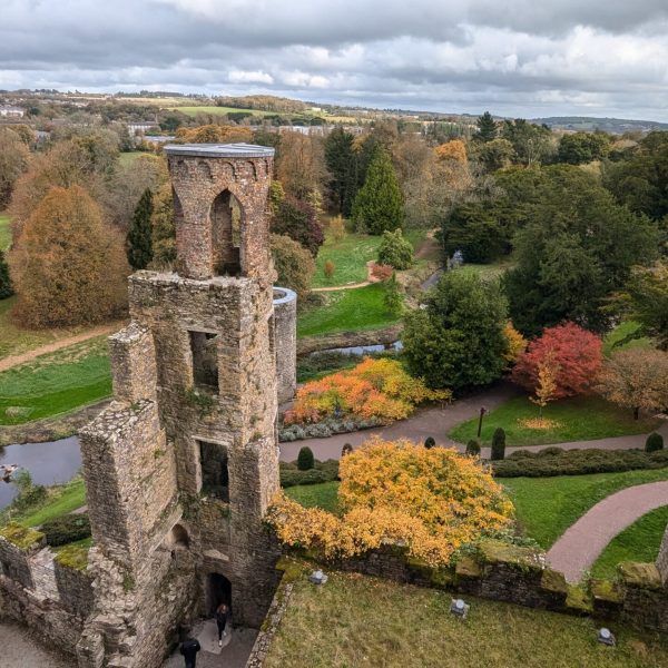 Blarney Castle, a historic medieval fortress in Ireland, visited during the Irish Splendor tour, where guests can explore its rich history and kiss the legendary Blarney Stone.