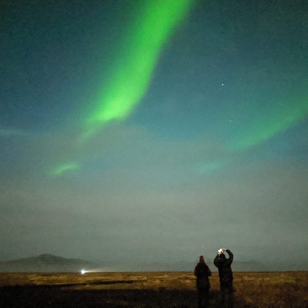 Witnessing the mesmerizing Northern Lights in Myrdalshreppur, a breathtaking experience on the Iceland's Magical Northern Lights tour.