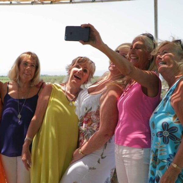 A group of women enjoying a moment of the tour In the Footsteps of Aphrodite: Western Cyprus.