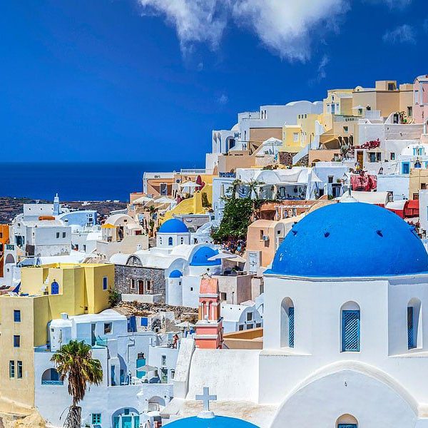 The houses and characteristic blue roofs of Greece. Greek Island Hopping with Canyon Calling Adventures