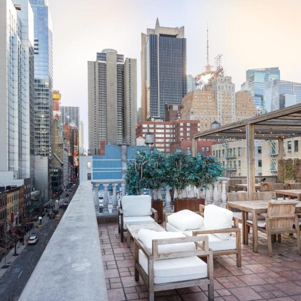 The patio at the Hotel Scherman, a boutique hotel in New York City, New York, recommended by JourneyWoman readers as a safe place for women to stay.