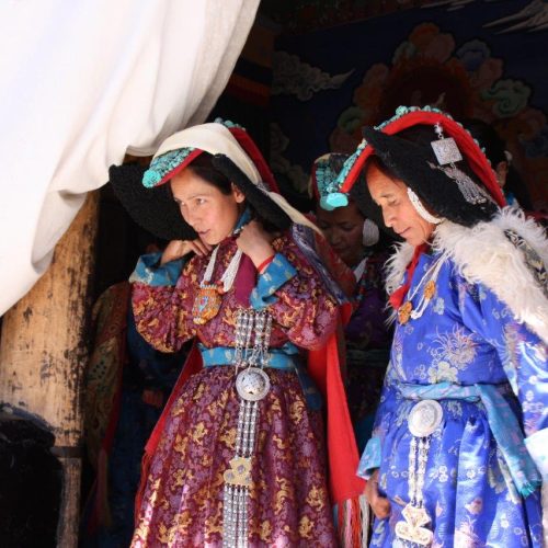 Two Ladakhi women dressed in traditional garb - Global Family Travels