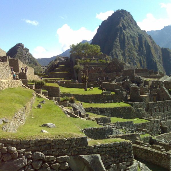 A scenic view from Machu Picchu, Peru: Machu Picchu and Lake Titicaca- Collette Travel