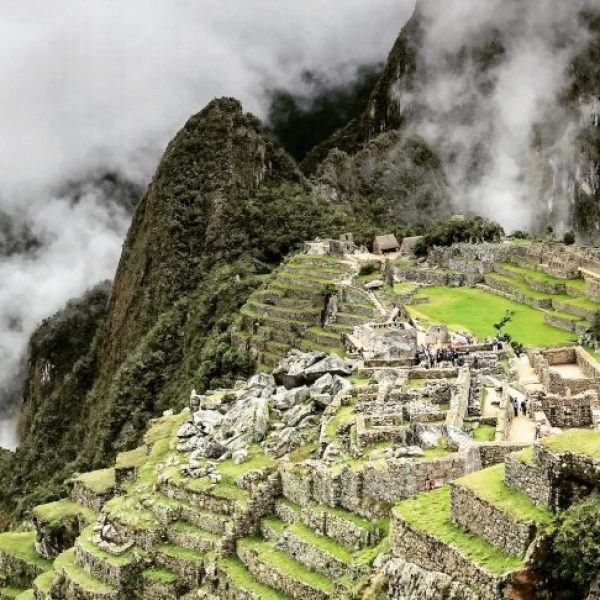 Marvelling at the view of Machu Picchu on a cloudy day - Machu Picchu Volunteer Trip - Conservation VIP