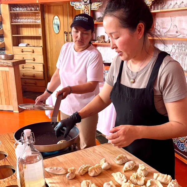 Learning to Make Mongolian Buuz (Dumplings) in the tour Mongolia: Nomads, Eagle Hunters, and the Land of Chinggis Khaan