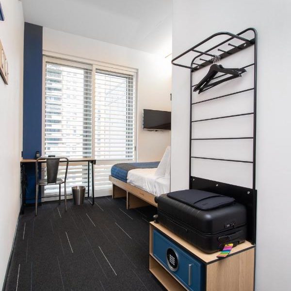 A simple room at the POD Times Square in New York, New York, recommended as a safe place for women to stay.