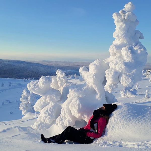 A participant enjoying a moment of the tour Yoga and Adventures in Finland