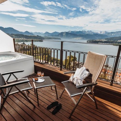 A view of the mountains from the balcony of a suite at the Art Deco Hotel Montana in Luzern, Switzerland, a safe place for women to stay.