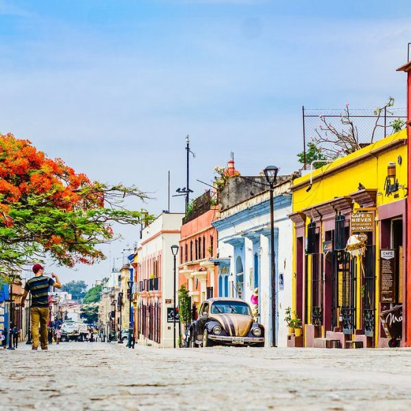 Vibrant, colorful streets of Oaxaca lined with historic architecture and lively culture - Vibrant Oaxaca