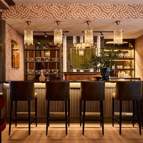 The bar area at the Zelda Dearest, a Lark Hotel, and safe place for women to stay in Asheville, North Carolina.