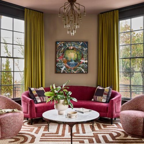 A luxe sitting area at the Zelda Dearest, a Lark Hotel, and safe place for women to stay in Asheville, North Carolina.