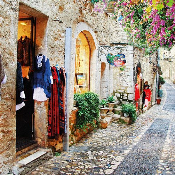 A cobble-stoned street of Alassio, where you will stroll as part of the French & Italian Riviera Splendor tour by Just You.