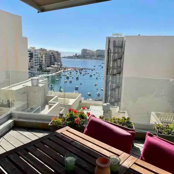 A view of the bay from this apartment in Saint Julian's, Malta, recommended as a safe place for women to stay by a JourneyWoman reader.