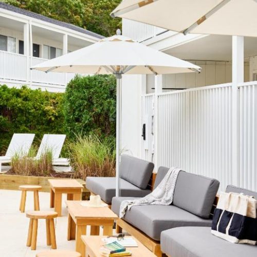 The exterior lounge area at the Bluebird Parker Beach Lodge in South Yarmouth, Massachusetts.