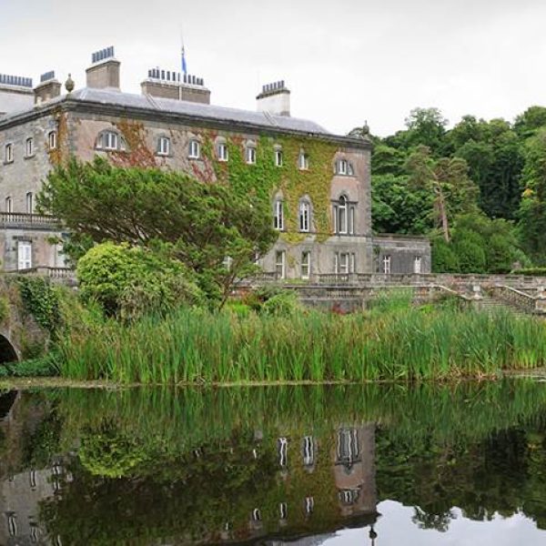 Admiring the majestic 18th century Westport House from the lake - Best of Ireland - Brendan Vacations