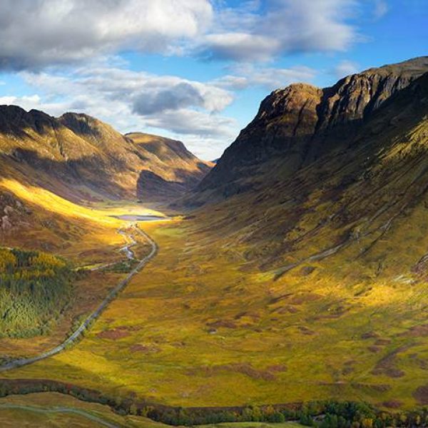 Panoramic view of the rugged Glencoe Mountains on the way to admire The 'Glen of Weeping' - Highland Trail inspired by Outlander - Brendan Vacations