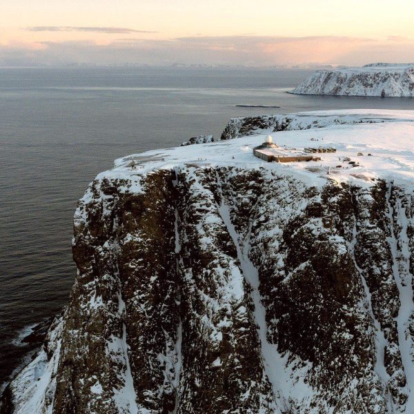 An aerial view of ice-covered Nordic fjords and the ocean beyond - 6-Day Norwegian Voyage: Southbound - Hurtigruten