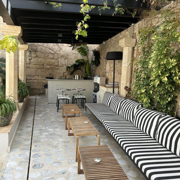 A long and inviting patio area at the Concepcio by Nobis in Mallorca, Spain, recommended as a safe place for women to stay.