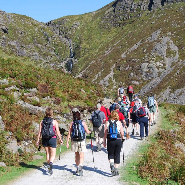 A group of hikers heading to explore the Nire Valley in the Comeragh Mountains - Tastes and Thrills of Ireland - Brendan Vacations