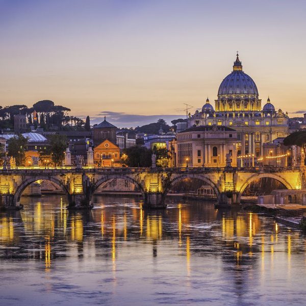 Admiring the St. Angelo Bridget at dusk - Fall in Love with Rome