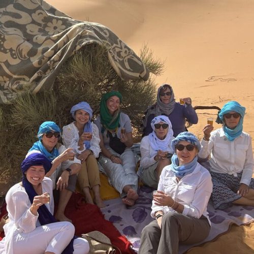 Group of women enjoying tea on a tour with The Voyagiste